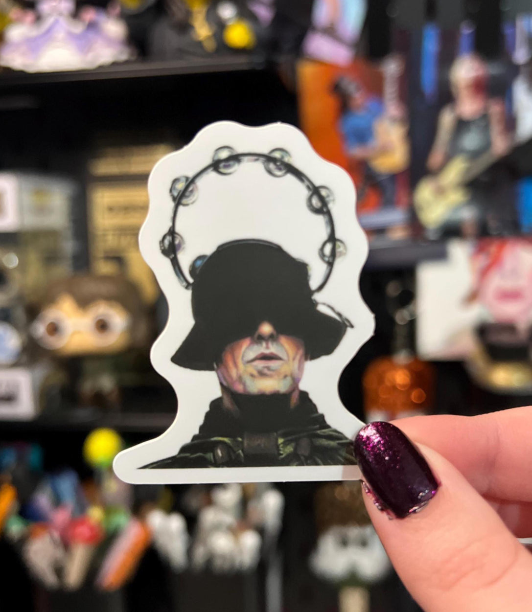 Liam Gallagher with his tambourine on his head Sticker